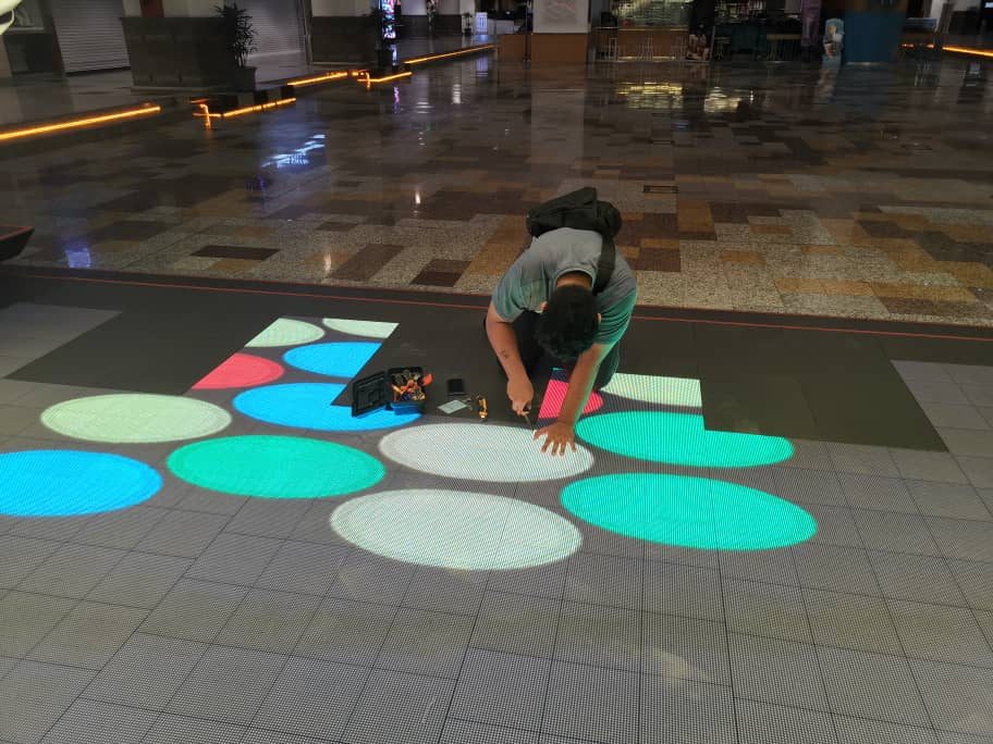 Interactive LED floor panels lit
